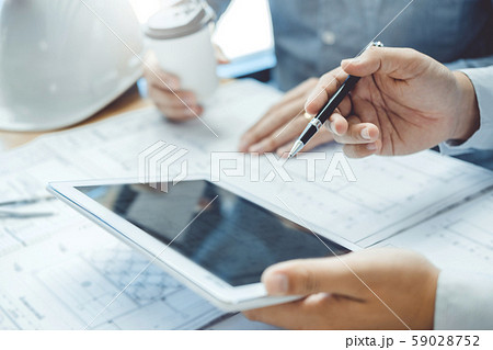 Engineer meeting for architectural with tablet 59028752