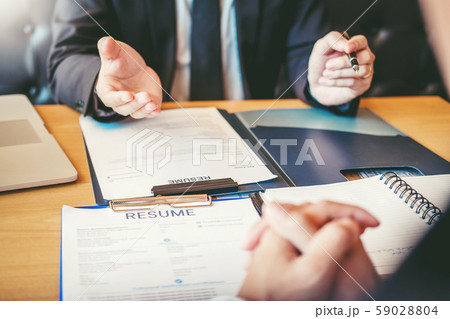 Job interview concept , Senior manager reading a Job interview concept , Senior manager reading a 59028804