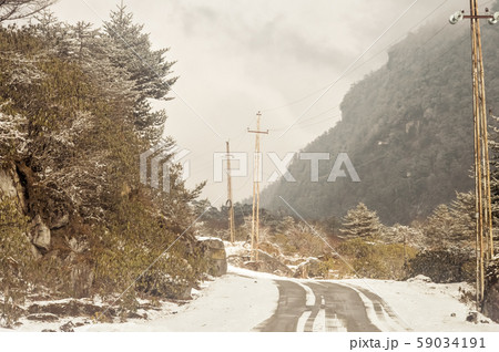 Himalayan mountain road in winter. Leh Manali Highway, Jammu and Kashmir, India 59034191
