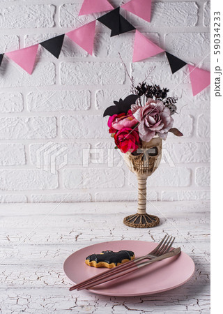 Halloween table setting in pink colors Halloween table setting in pink colors 59034233