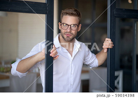 Stylish businessman wearing white shirt feeling thoughtful Stylish businessman wearing white shirt feeling thoughtful 59034398