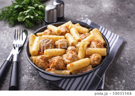 Pasta with meatballs in tomato sauce. Pasta with meatballs in tomato sauce. 59035568