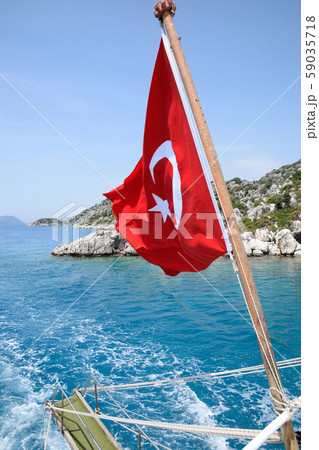 Turkey flag at the stern of a pleasure yacht. View 59035718