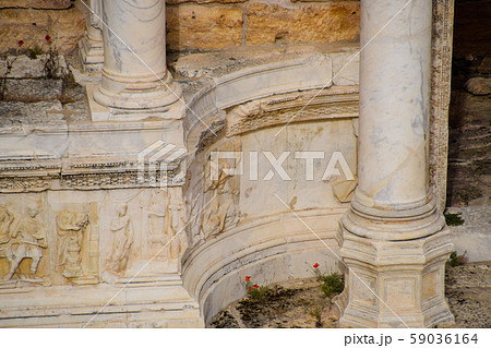 Bas-reliefs of antique scenes on the gables of the 59036164
