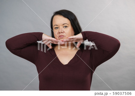 Sad woman showing her face 59037506