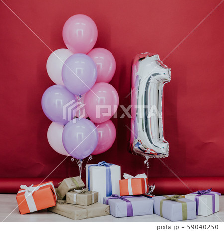balloons of different colors with gifts for birthday 59040250