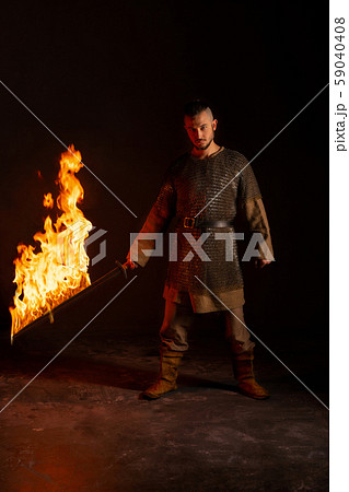 Handsome brunette in viking image view in the dark Handsome brunette in viking image view in the dark 59040408