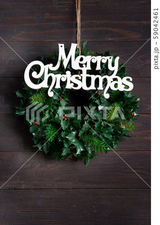 Christmas decoration wreath of green leaves and 59042461