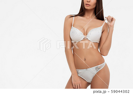 Slim female in white underwear 59044302