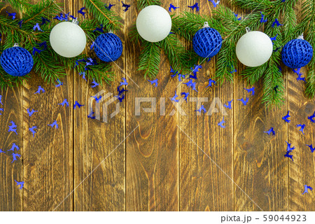 Christmas decorations, blue and white balls on a Christmas decorations, blue and white balls on a 59044923