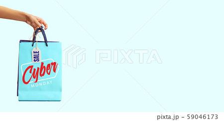 Hands holding gift box with black friday lettering Hands holding gift box with black friday lettering 59046173