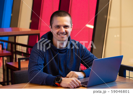 Adult man freelance developer or designer looking in camera 59046801