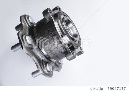 New Wheel hub assembly with bearing. This is part of the car suspension on a gray background with a 59047137
