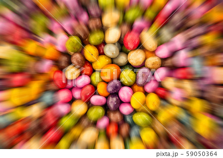 glazed candy dragee motion blur lines background 59050364