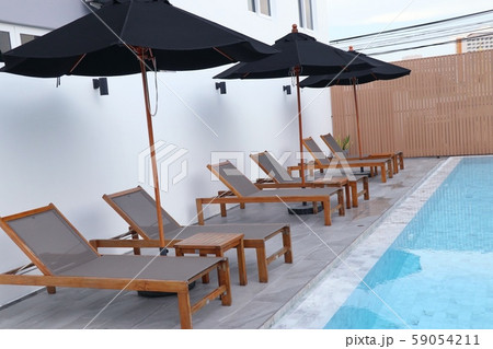 Chair loungers by the pool Chair loungers by the pool 59054211