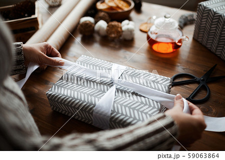 Decorating gift box with ribbon Decorating gift box with ribbon 59063864