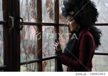 Portrait of a young sexy witch wearing 59065063