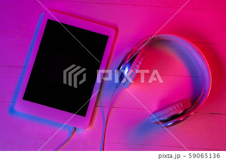 Top view of set of gadgets in purple neon light Top view of set of gadgets in purple neon light 59065136