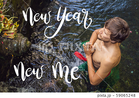 NEW YEAR NEW ME concept Man in holy spring water temple in bali. The temple compound consists of a NEW YEAR NEW ME concept Man in holy spring water temple in bali. The temple compound consists of a 59065248