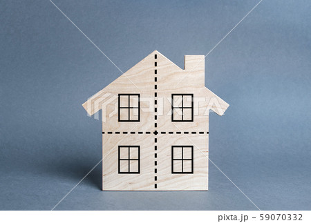 Residential building divided by a dotted line into four equal parts. Divorce concept. Disputes over division process of real estate and property after divorce. Distribution of the right 59070332