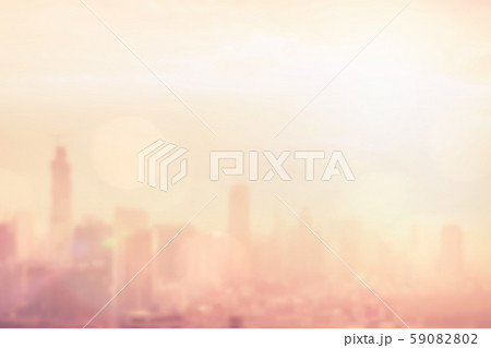 Blur background of morning light on sky with bokeh and sun flare at Bangkok city night life 59082802