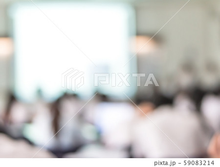 Blur school background back view university students writing answer doing exam in classroom Blur school background back view university students writing answer doing exam in classroom 59083214