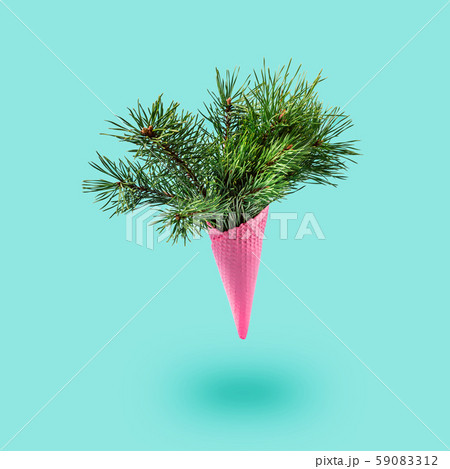 Painted pink ice cream cone with fluffy fir 59083312