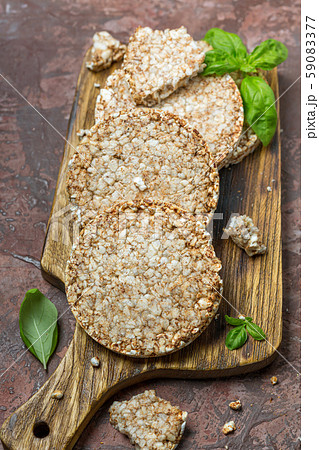 Round whole grain cereal crispbreads. 59083377