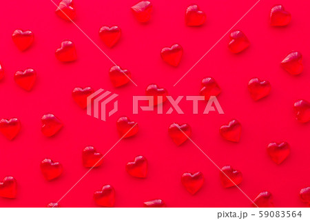 red background with hearts pattern, flat lay red background with hearts pattern, flat lay 59083564