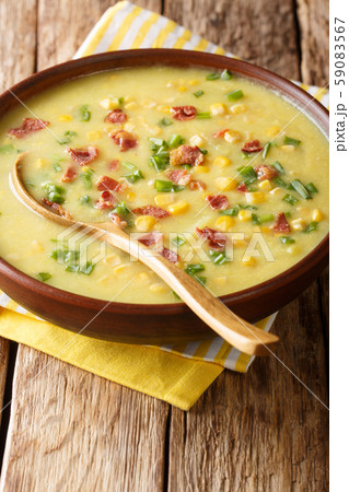 Traditional hot corn chowder with bacon and green 59083567