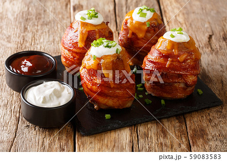 Grilled volcano whole potatoes with bacon and Grilled volcano whole potatoes with bacon and 59083583