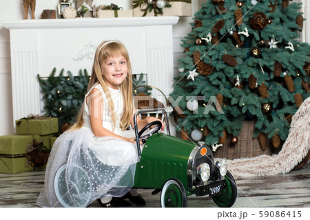 little girl in a white dress rides a vintage little girl in a white dress rides a vintage 59086415