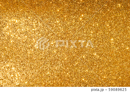 shine and sparkle of golden glitter abstract background	 59089625