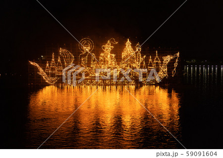 Traditional fire boat floating in Mekong river at 59091604