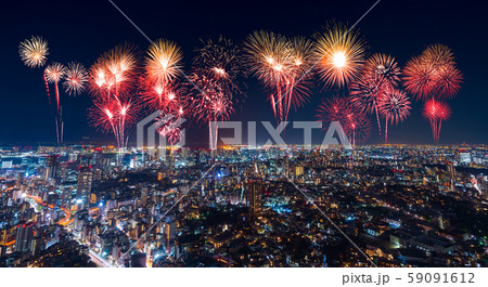 Fireworks over Tokyo cityscape at night, Japan 59091612