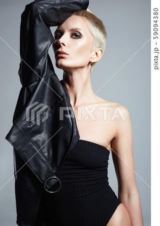 Fashionable beautiful woman with short hair 59094380