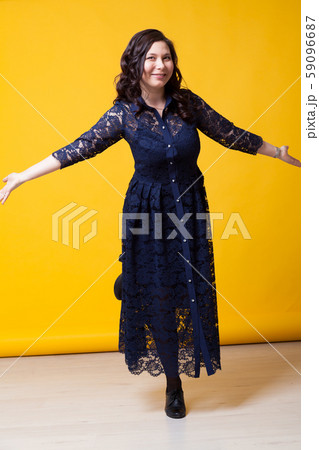 Portrait of a beautiful Asian woman in a blue dress Portrait of a beautiful Asian woman in a blue dress 59096687