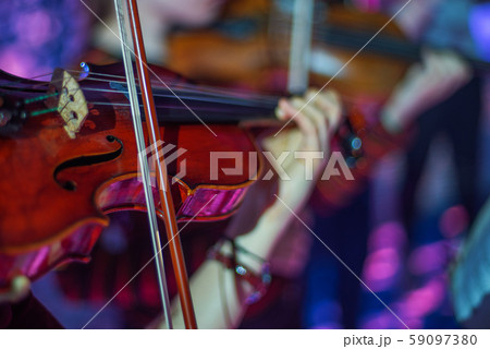 violin at a concert 59097380