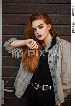 Stylish young model girl in fashion jacket  59098513