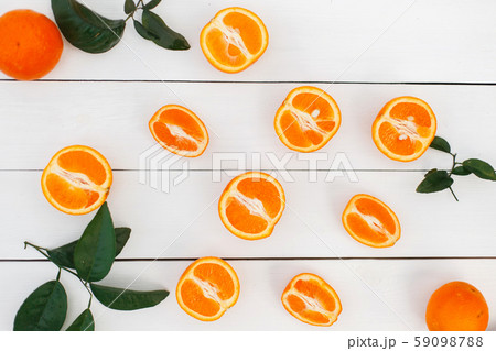 Natural fresh orange with leaves lies  59098788