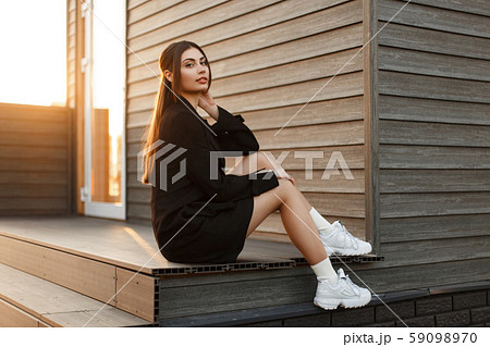 Fashion woman in fashionable clothes with sneakers 59098970