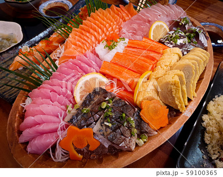 fresh sashimi set on wood dish fresh sashimi set on wood dish 59100365