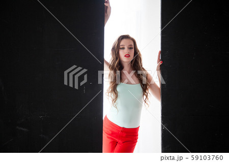 Portrait of a fashionable beautiful girl with long hair Portrait of a fashionable beautiful girl with long hair 59103760