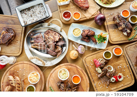 Barbecue restaurant menu. Many different food on the table. Dinner party or Banquet. Top view Barbecue restaurant menu. Many different food on the table. Dinner party or Banquet. Top view 59104709
