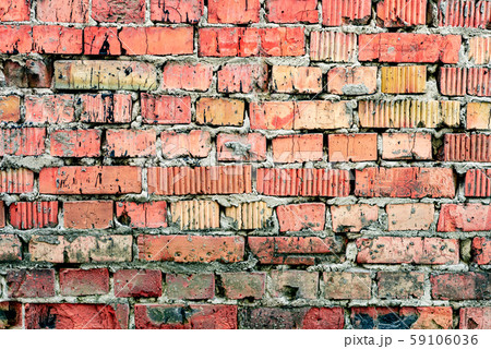 Texture of a brick wall with cracks and scratches Texture of a brick wall with cracks and scratches 59106036