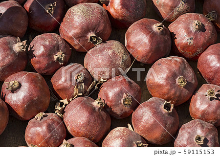 Background iz fruit ripe pomegranates shot closeup  59115153