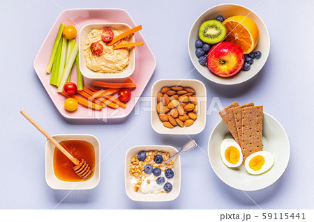 Healthy snack on a pastel background. 59115441