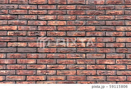 A wall of red, old brick. Background, texture and concept. 59115806