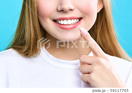 Perfect healthy teeth smile of a young woman. Teeth whitening. Dental clinic patient. Image 59117705