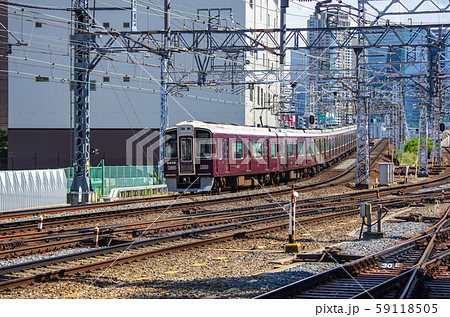 大阪 十三駅を出る阪急電車 9300系の写真素材